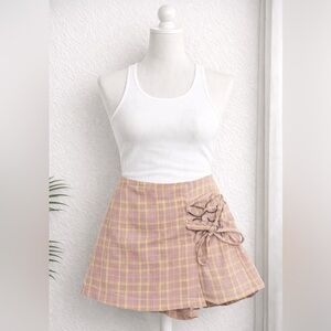 Y2K pink and yellow plaid wrap-style mini skort